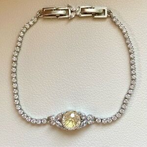 Silver Tennis Bracelet with Yellow Center Stone